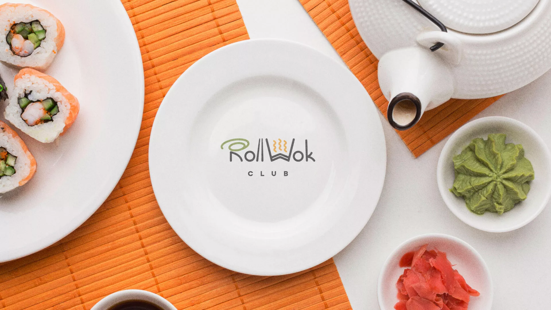 Разработка логотипа и фирменного стиля в Костроме для суши-бара «Roll Wok Club» Разработка логотипа и фирменного стиля в Костроме для суши-бара «Roll Wok Club»